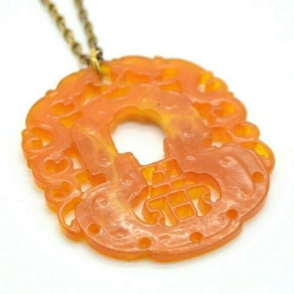 Vintage Jewelry - Orange Faux Stone Acrylic Asian Carved Amulet